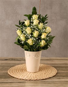 Cream roses In A Vase Arrangement