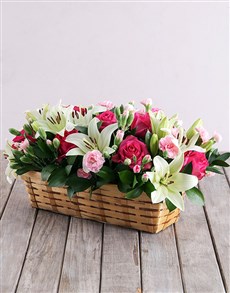 A Rectangle Basket with mixed bouquet Of Flowers