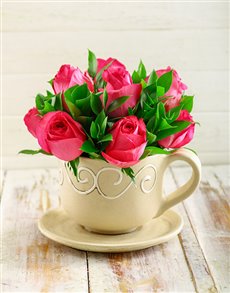 A Tea Cup With Cerise Roses